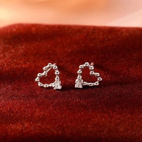 Sterling Silver 'Gaëlle' Studded Hollow Heart and Simulated Diamond Earrings - Picture 3 of 3